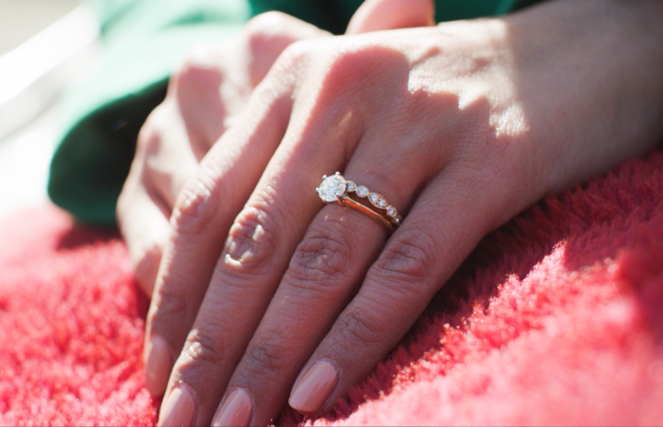 Diamond ring on women's handling